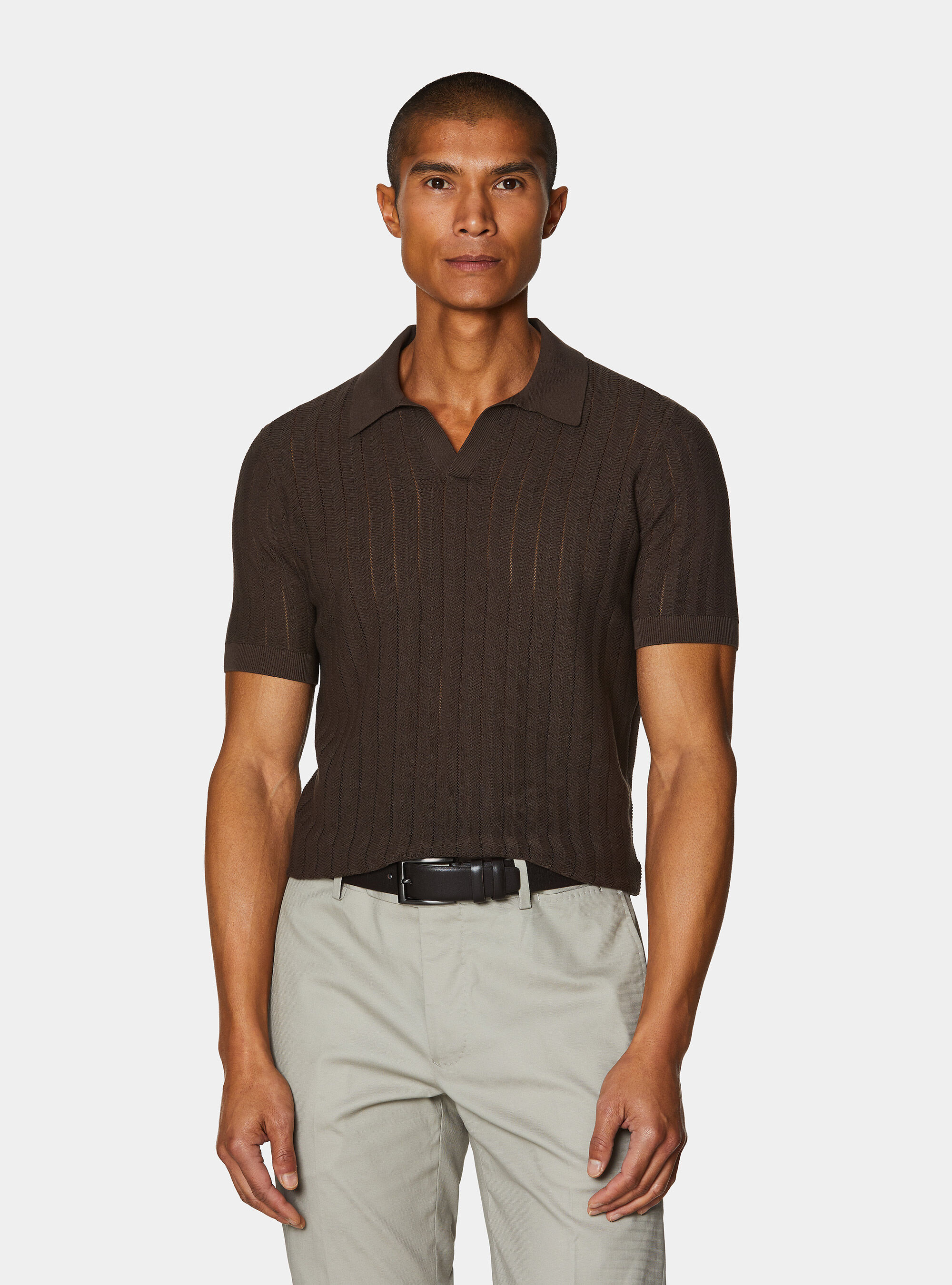 Perforated polo shirt in herringbone cotton