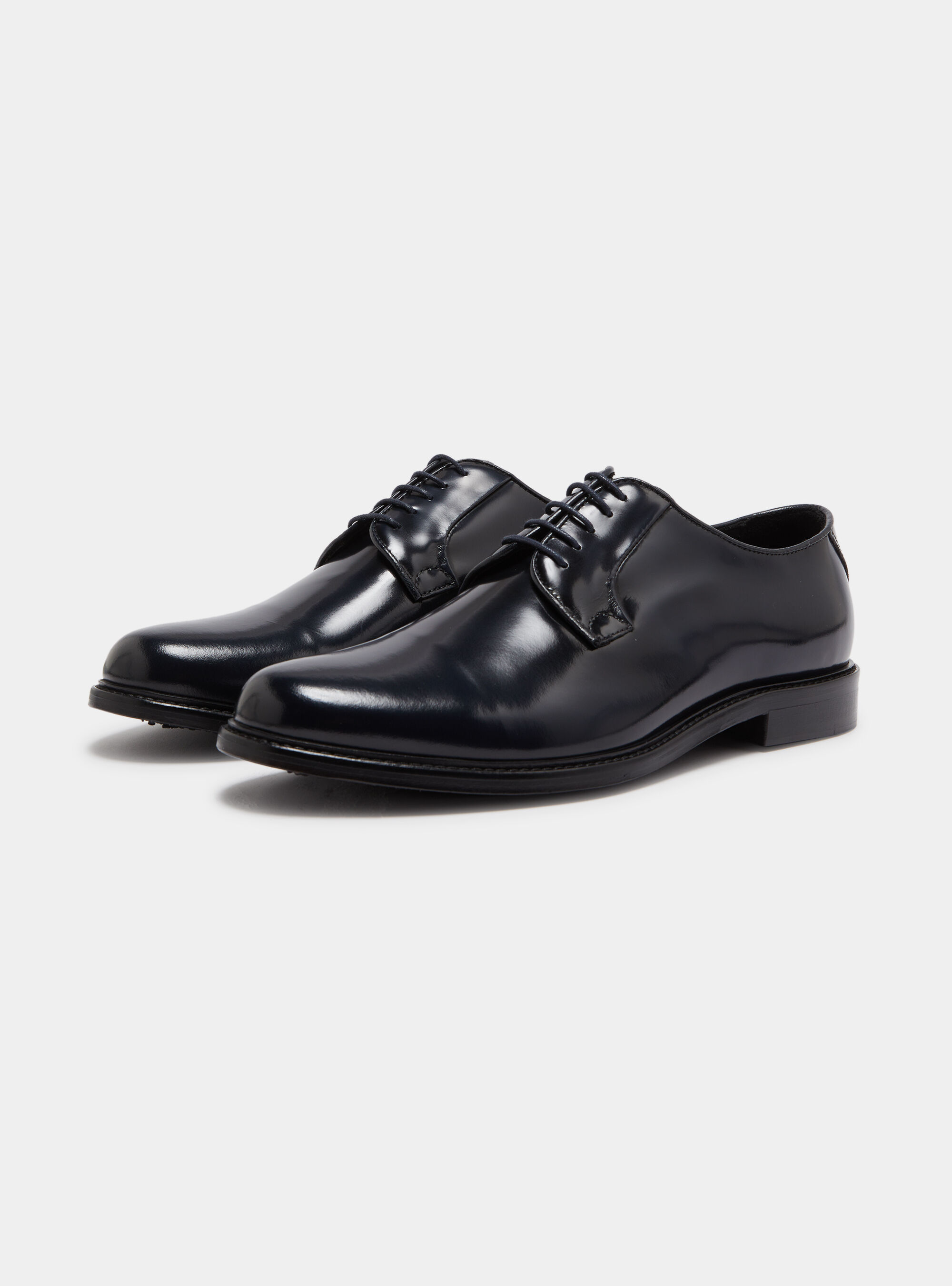 Abrasivated leather derby